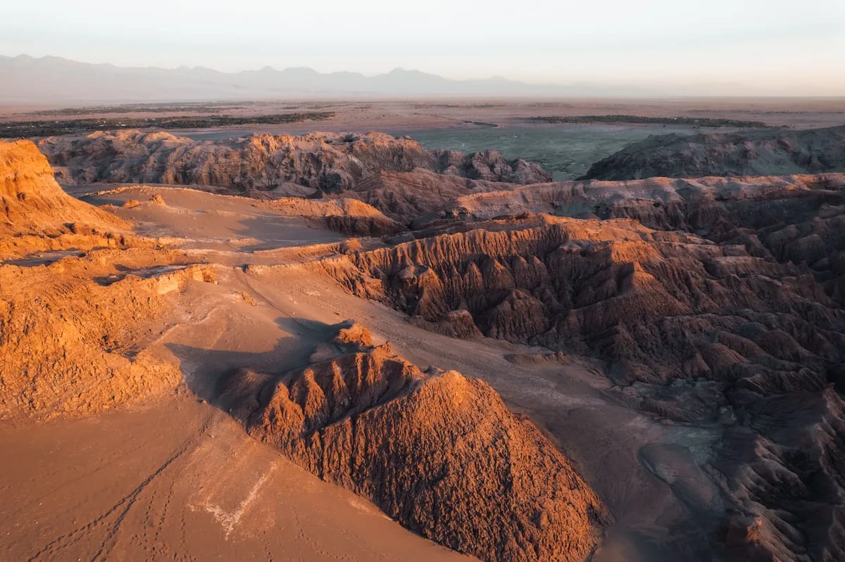 Panoramic view of Valle de la Luna (Moon Valley) in the Atacama Desert showing otherworldly rock formations