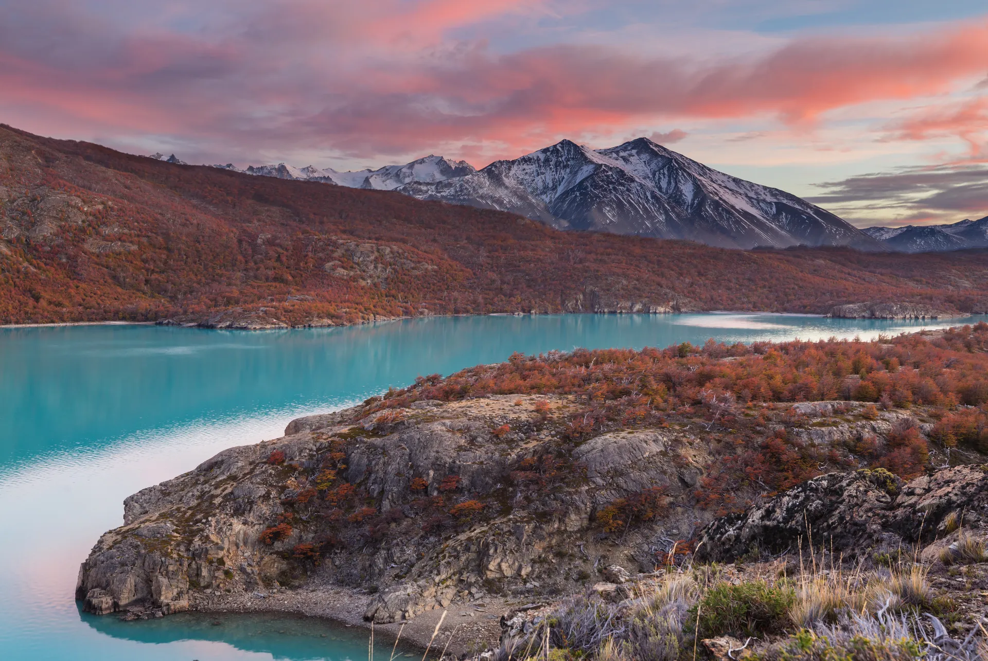 Autumn landscape in Chilean Patagonia with golden colors and dramatic mountains